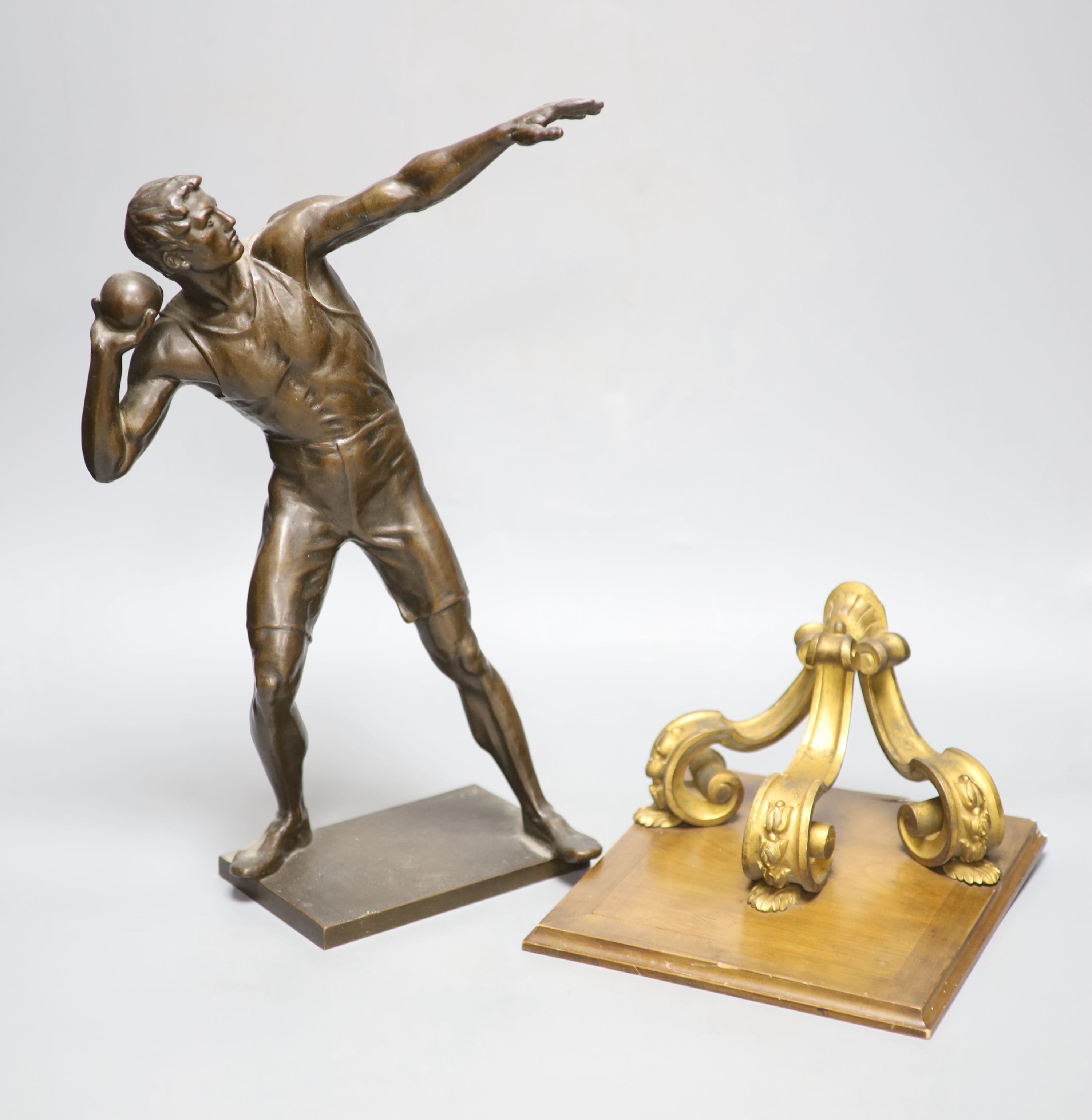 After Robert Cauer (1863-1947) a bronze figure of a shot-putter, c.1925